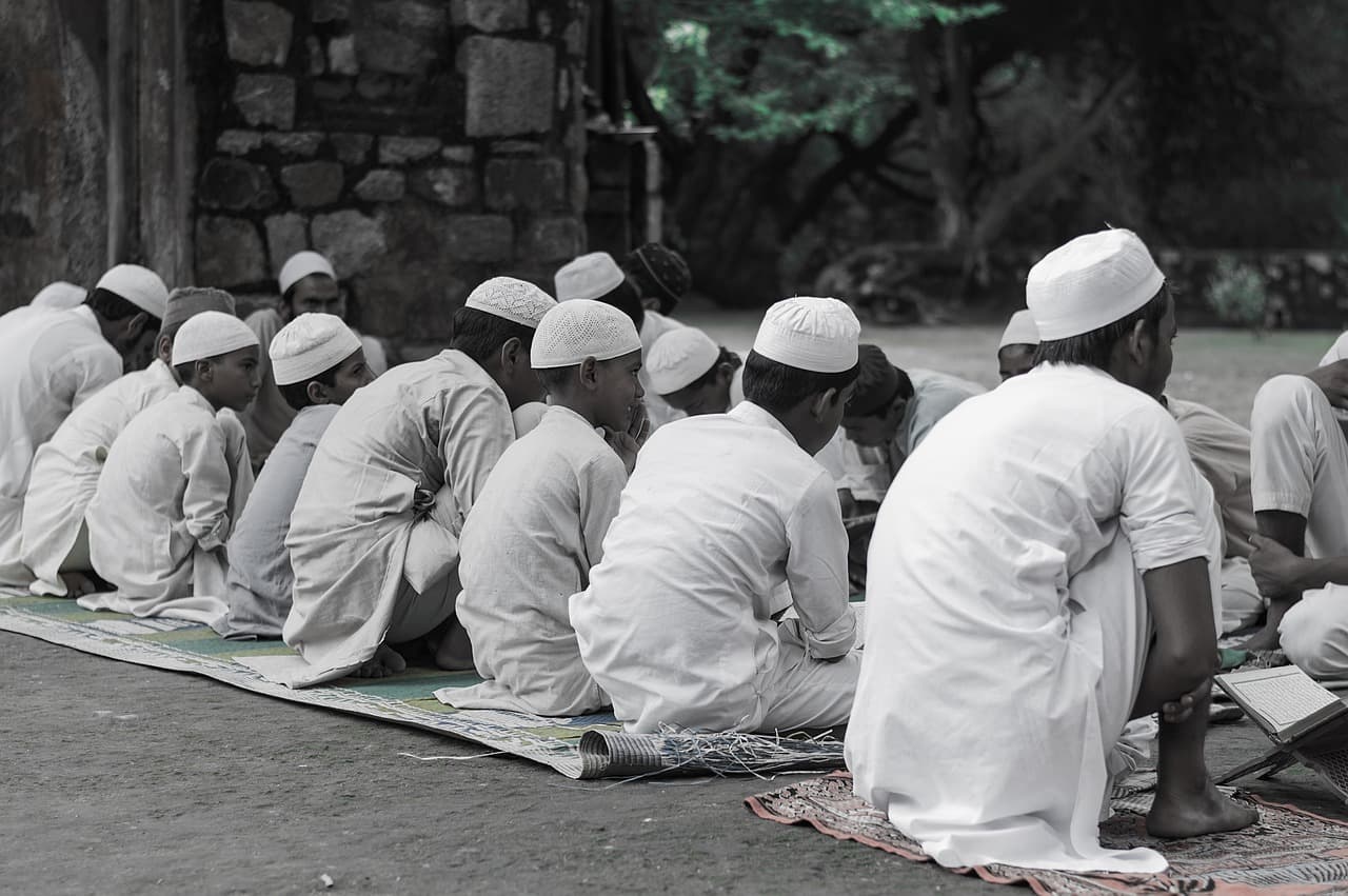 Students studying the Quran together