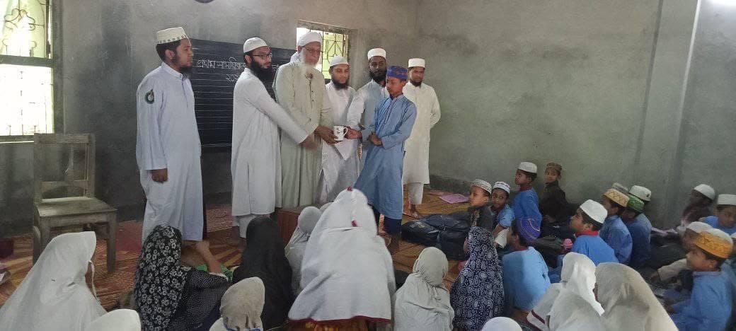 Teachers and students gathered for the prize giving in the classroom